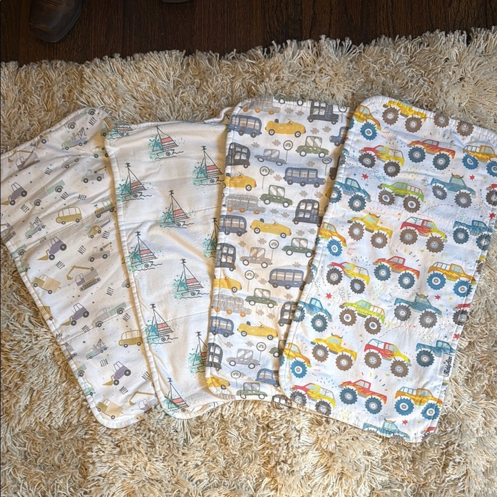 Baby burp cloths, set of 4. Brand is “Hiddy Star”